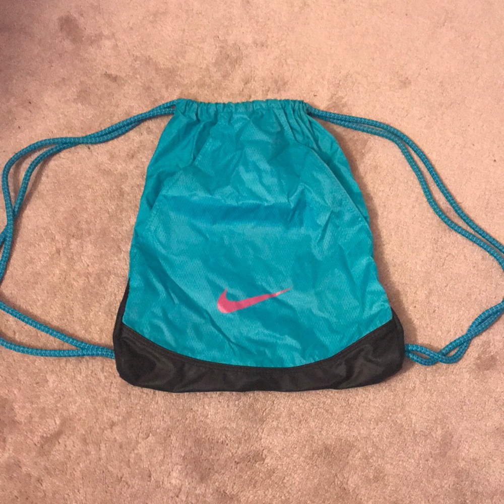 Blue with pink Nike drawstring bag